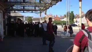 Welsh choir sings for delayed passengers