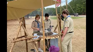Scouts Build a Chippewa Kitchen and Cook "Monkey Bread" to Promote Outdoor Skills