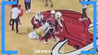 Conor McGregor knocks out Heat mascot in bizarre promotion at NBA Finals | Morning in America