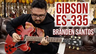 Branden Santos playing a Gibson ES-335 at Norman's Rare Guitars