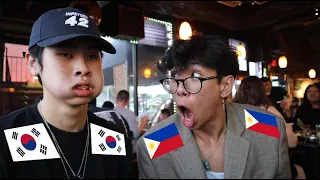 A Korean and Filipino walk inside a KBBQ restaurant...