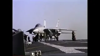 F-14A with Fighter Squadron Two One Three [VF-213] Blacklions taxis from waist to bow catapults.