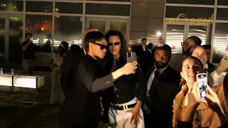 Bella Hadid swarmed by paparazzi leaving the Tom Ford Fashion Show in New York