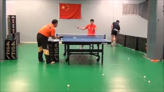 service Ma Long doing multiball with head coach Liu Guoliang