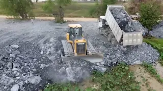 Incredible Bulldozer SHANTUI Pushing Big Stone into Lutos lake with many Dumps truck 25T Unloading