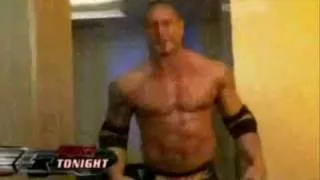 Batista is interrupted by a fan at backstage