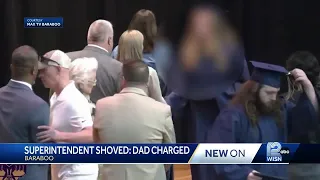 Man charged for pushing superintendent off-stage at Wisconsin high school graduation