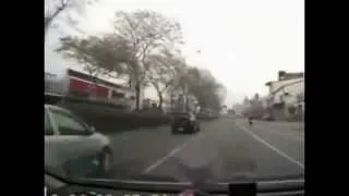 Motorcycle Crashes Into A SUV and Goes For A Ride