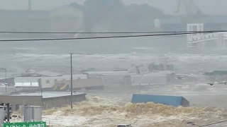 Devastating Tsunami  in Port of Sendai. Japan Earthquake 2011