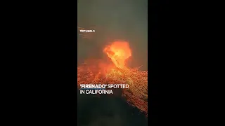 California wildfire sends flames swirling