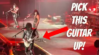 Paul Stanley is VERY upset with his guitar (and lips....)