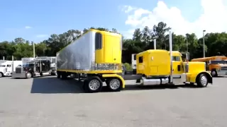 Professional driver jackknifing a 53 foot trailer into a parking space.