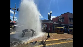 Water erupts in the air after vehicle crashes into fire hydrant & Punta Gorda Irish pub