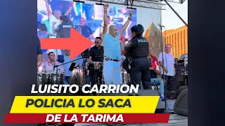 POLICIA SACA A LUISITO CARRION DE LA TARIMA