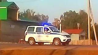 Russian police car UAZ Patriot blue red light