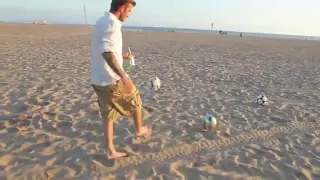 David Beckham Unbelievable Shooting Skills On Beach.flv
