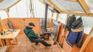 Hot tent camping alone in the forest