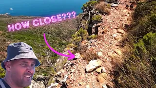 Man on the edge - Table Mountain, Cape Town: Woody Ravine and Three Firs (#17)
