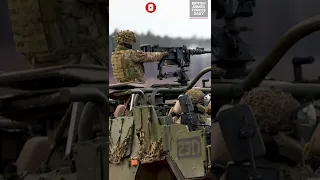 UK SOLDIERS FIRING GPMG AND 50 CAL MACHINE GUNS FROM JACKAL RECONNAISSANCE VEHICLE