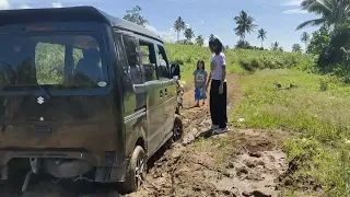 Mini Van Stuck in a Mud