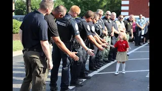 Daughter of Fallen Police Lieutenant Escorted to School