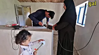 Plumbing the house of a nomadic man and helping his mother and daughter in cleaning the house