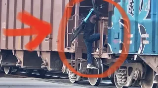 Man Hops Moving Train With Bicycle!  Most Dangerous Train Hopping Ever!  Florida East Coast Railway!
