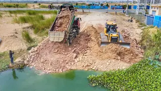 Marvelous! Operator Skills Bulldozer Pushing Soil Make New Road And 10 wheel Dump Truck Unloading