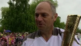 Sir Steve Redgrave carries Olympic torch