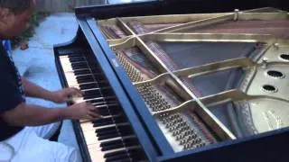 Kris Nicholson Playing A Wissner Grand Piano