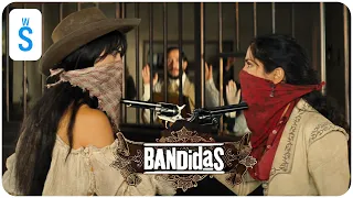 Bandidas (2006) | Scene: Sara and Maria develop bank robbery skills