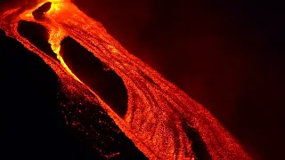 Italy’s Mount Etna spurts lava into night sky