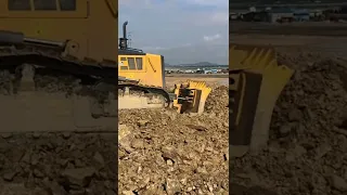 Amazing Shantui Bulldozers pushing rock.