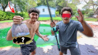 1v1 WHO CAN GET THE BIGGEST FISH FOR THE BACKYARD POND!!! (Blindfolded)