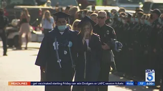 Slain firefighter's daughter graduates from Saugus High School in emotional ceremony