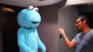 Ryan Tedder from OneRepublic teaching Cookie Monster the bodywaves dance move