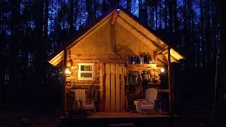 Father and Son building a road, cooking in the earthen oven at the off grid log cabin