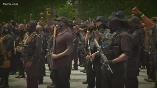 Group of armed demonstrators enter Stone Mountain Park