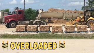 Overloaded end dump trailer