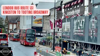 🚌🌧️ Explore London's urban charm aboard Bus Route 131