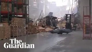 Damage filmed inside warehouse after fighter jet crash in California- video