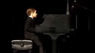 Brandon, 8, performs Billy Joel's "Piano Man"