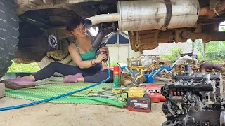 Genius girl repairs and maintains cars.