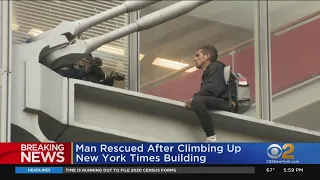 Man Climbs New York Times Building