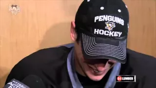 Dan Potash falls down during a Sidney Crosby interview