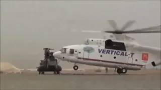 Russian Masterpiece Mil Mi 26 Picks Up A NATO CH 47 Chinook