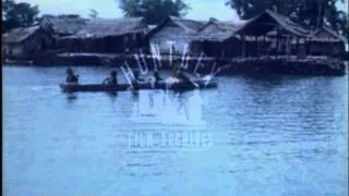 Coastal village in the Solomon Islands in the 1970's.  Film 32051