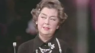 Rosalind Russell receiving a special Oscar® statuette