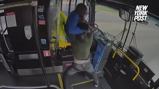 Pulse-pounding video captures passenger attacking driver on bus before it crashed into building