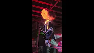 Dave Moody of Hairball as Gene Simmons of Kiss. Hair catches fire during rock show!